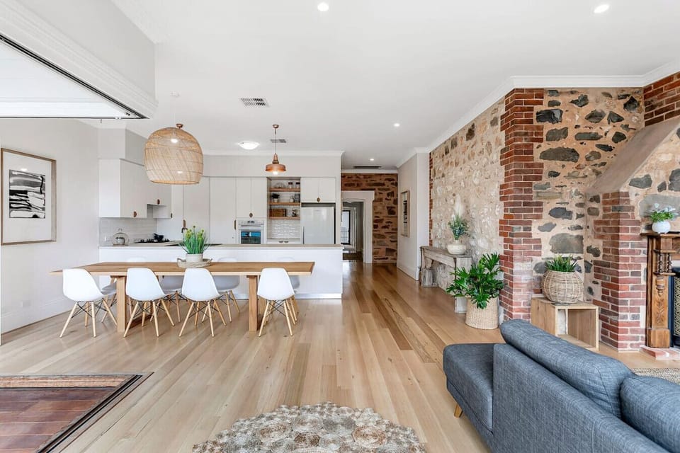 Cook, chat and connect in the open-plan kitchen and dining area, designed for easy family moments and shared meals.