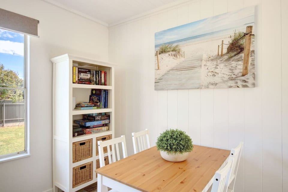 A second dining area sets the scene for game nights that stretch into the evening.