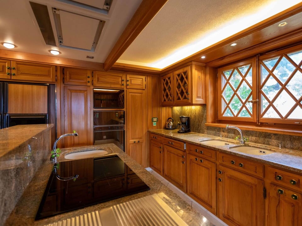 Kitchen, Countertop, Wood, Interior Design, Flooring, Ceiling, Cabinetry, Lighting, Light Fixture, Floor