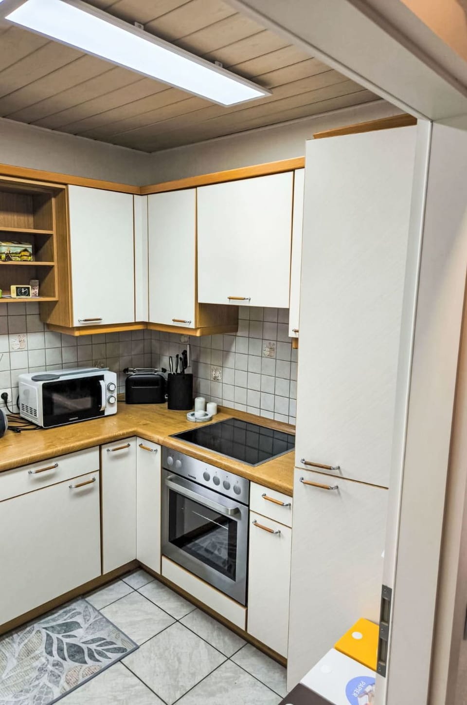 Kitchen Appliance, Kitchen, Countertop, Major Appliance, Cabinetry, Wood, Flooring, Home Appliance, Interior Design, Kitchen Sink