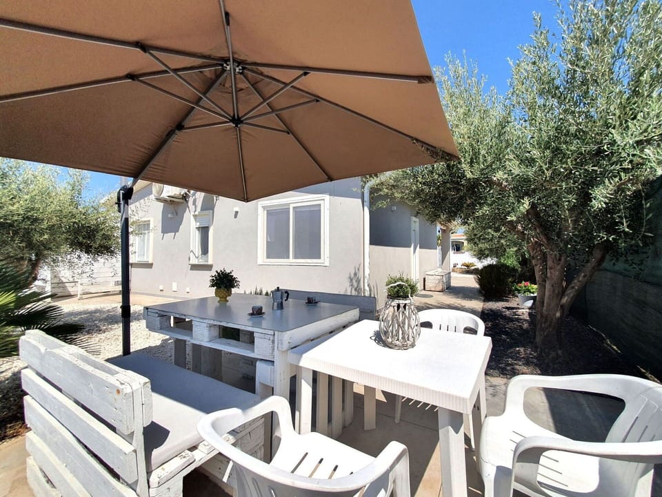 Furniture, Outdoor Furniture, Umbrella, Outdoor Table, Cottage, Chair, Porch, Deck, Shade, Plank