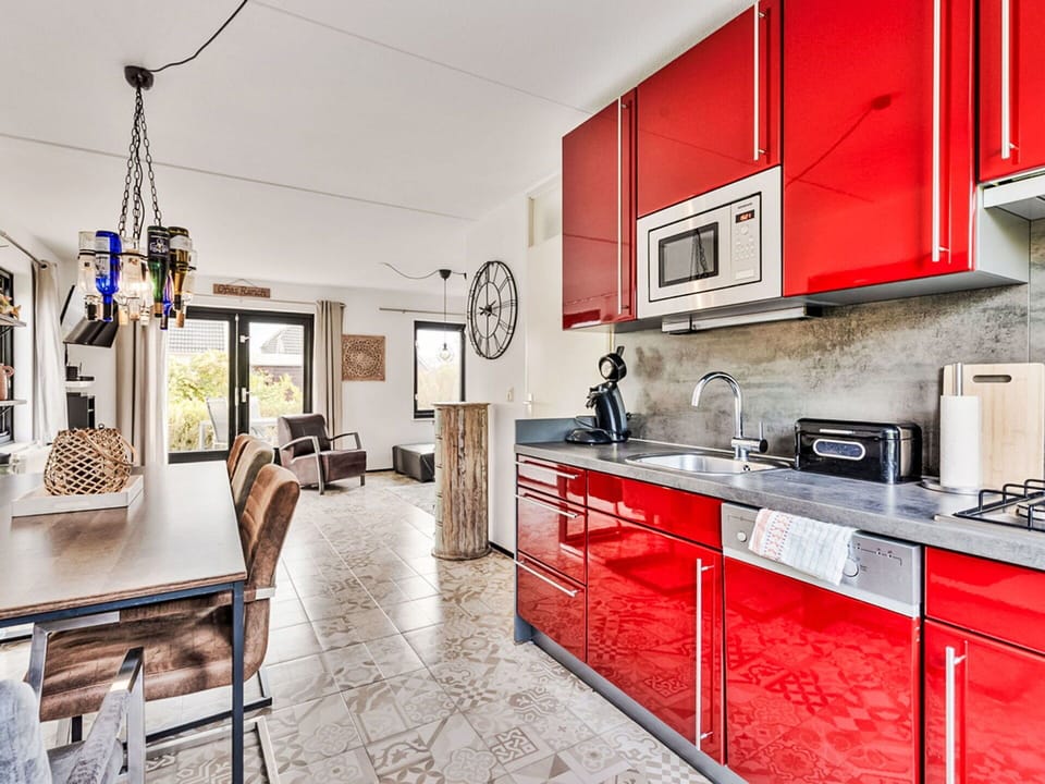 Furniture, Kitchen, Interior Design, Flooring, Floor, Ceiling, Countertop, Apartment, Lighting, Cabinetry