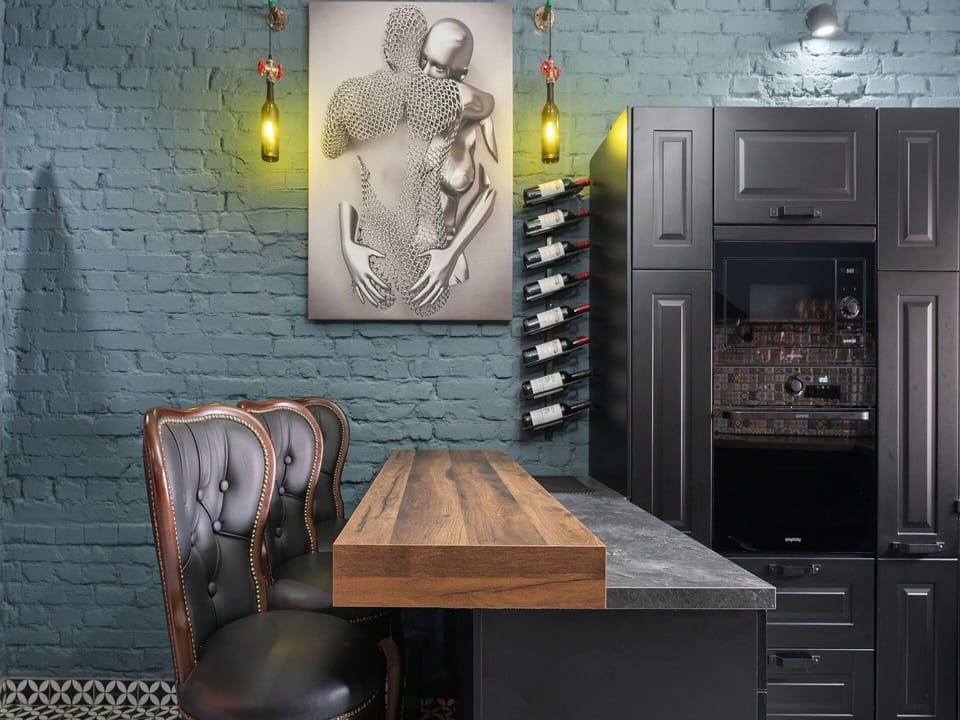 Furniture, Interior Design, Flooring, Lighting, Floor, Cabinetry, Countertop, Kitchen, Light Fixture, Wood Stain