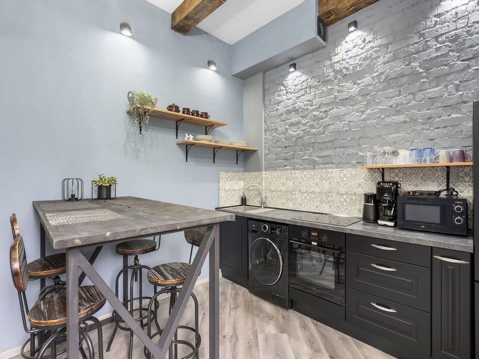 Furniture, Wall, Interior Design, Flooring, Kitchen, Countertop, Floor, Ceiling, Home, Lighting