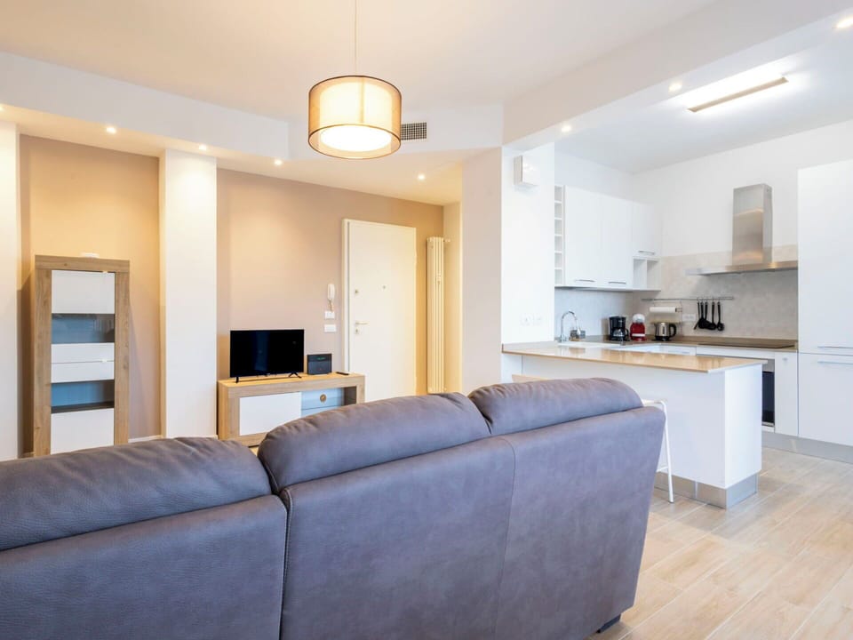 Furniture, Interior Design, Flooring, Floor, Wood, Room, Ceiling, Apartment, Lighting, Table