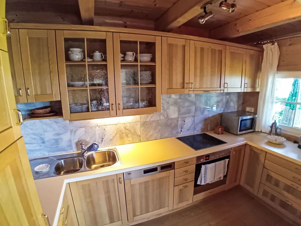 Wood, Flooring, Furniture, Kitchen, Cabinetry, Countertop, Floor, Interior Design, Kitchen Appliance, Wood Stain