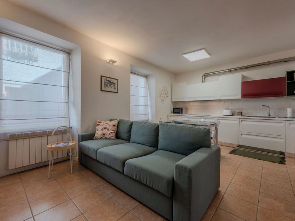 Furniture, Interior Design, Couch, Flooring, Floor, Room, Wood, Ceiling, Table, Living Room