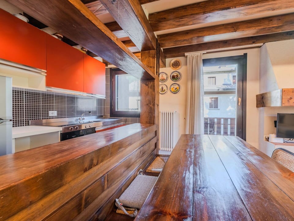 Interior Design, Wood, Flooring, Ceiling, Countertop, Floor, Kitchen, Furniture, Lighting, Wood Stain