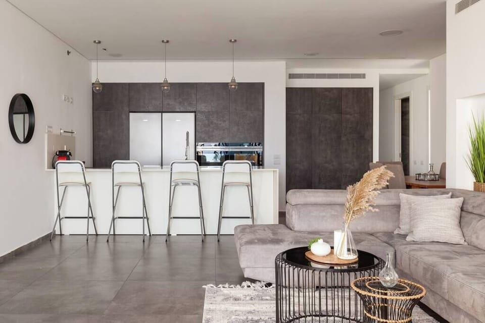 Open layout encourages social moments, balancing comfort with convenient access to restaurants and nightlife close by.