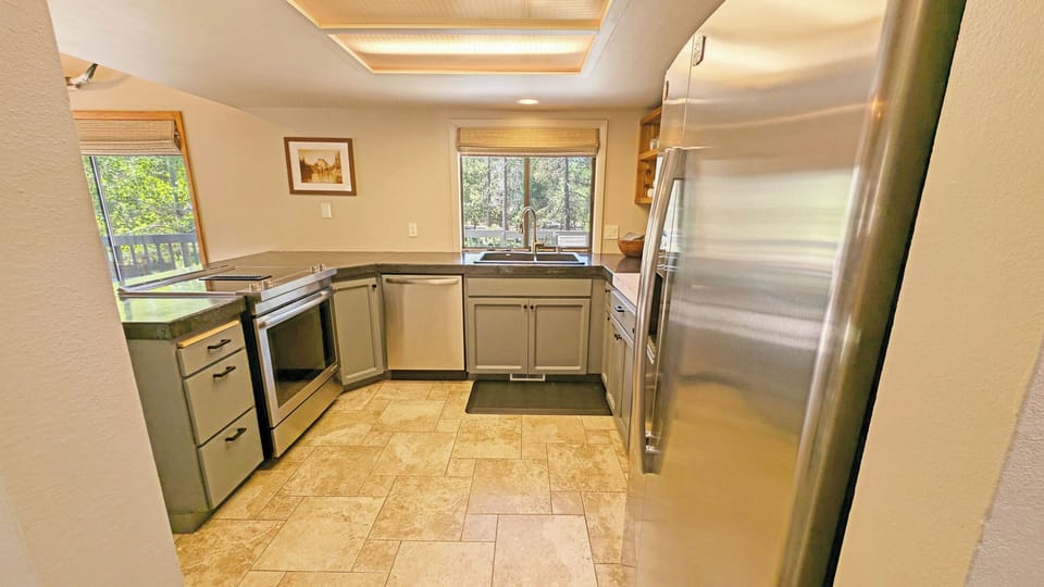 The Kitchen is completely stocked with Stainless Steel Appliances