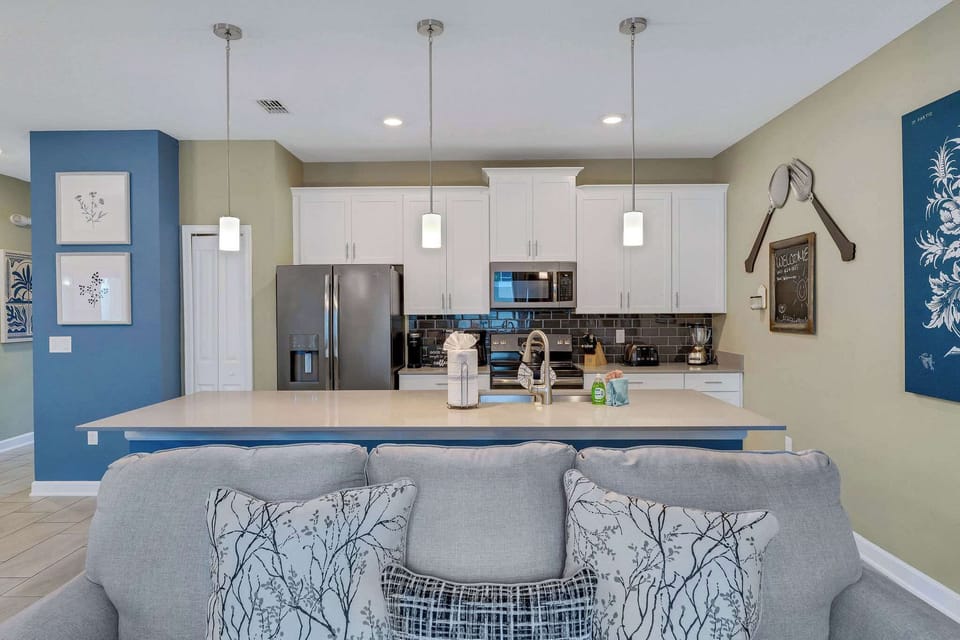 Enjoy a modern kitchen with all cooking essentials, beautiful finishes, and an inviting layout for home-style meals.