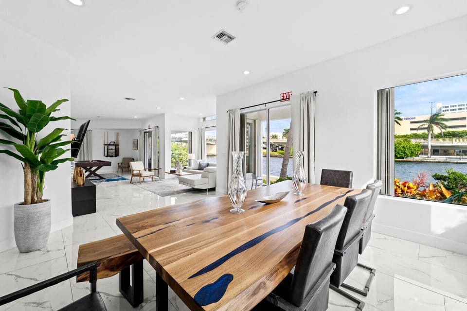 Beautiful Dining Room with Natural Wood Table and Open Plan Living Connection