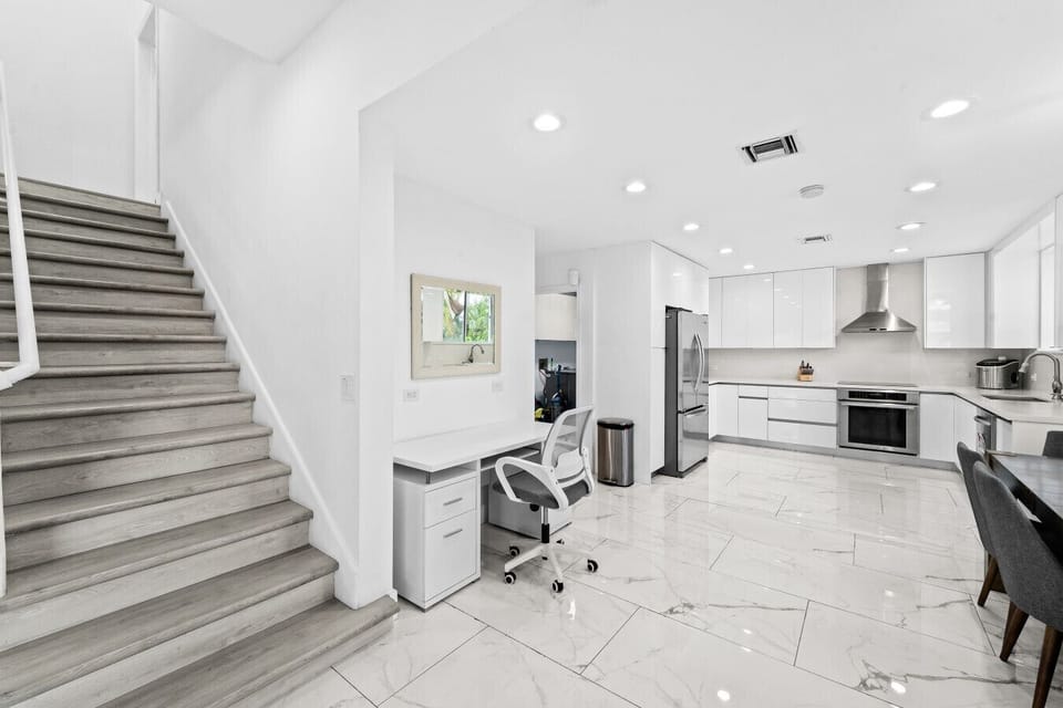 Multi Level Home with Seamless Flow Between Kitchen and Living Spaces