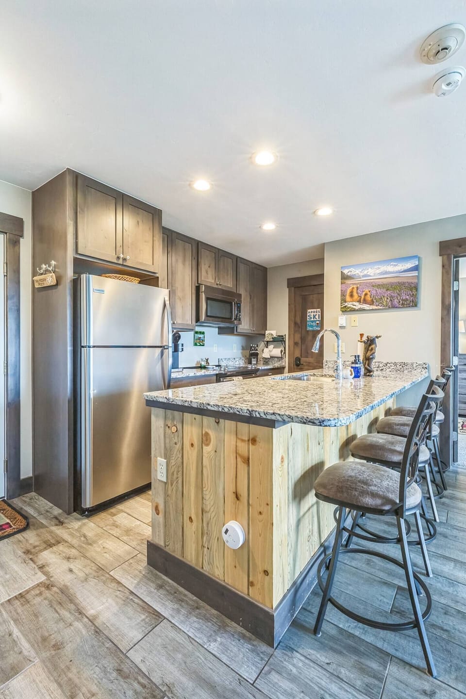 Whether you're flipping pancakes before a ski day or sipping wine while the chili simmers, this fully stocked kitchen makes it easy to cook, connect, and stay cozy.