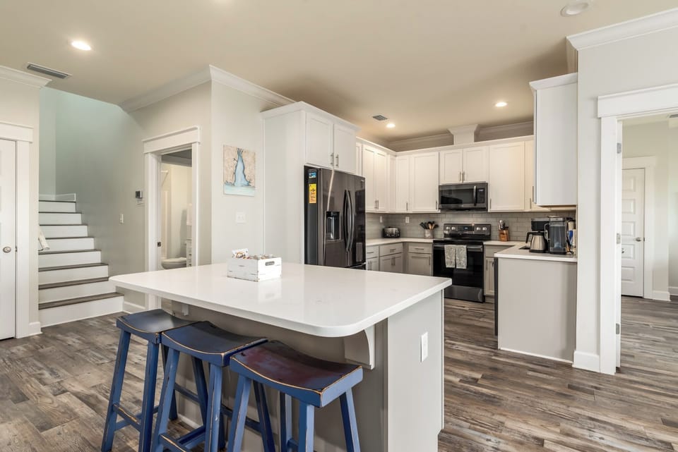 Coastal Château Kitchen Island with Bar Seating