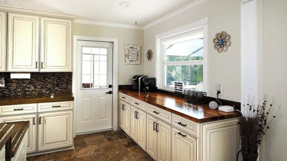 Prep Space with Coffee Bar and View Out to Pool