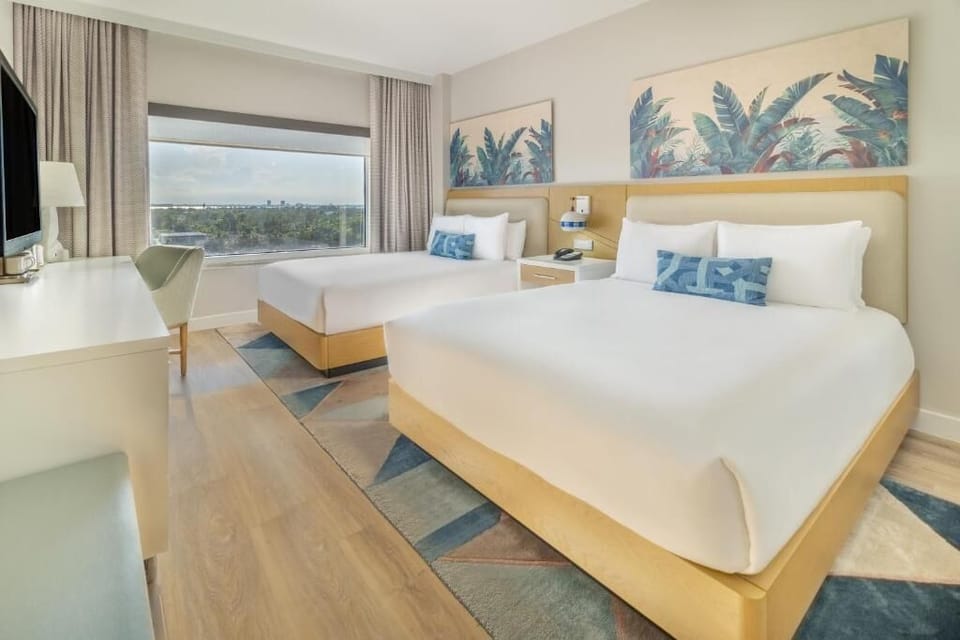 Wake up to sunshine and serene views from plush beds