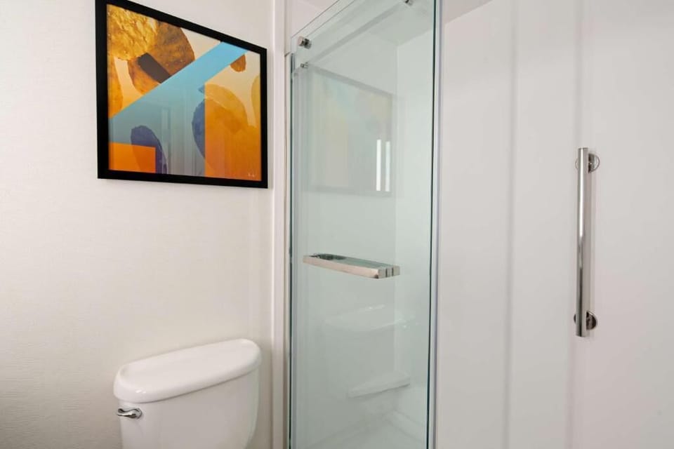 Refresh after adventures in a spotless, glass-enclosed shower.