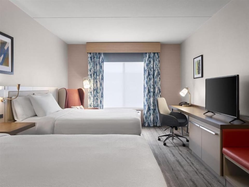 Settle in with two plush beds and a sunny window.