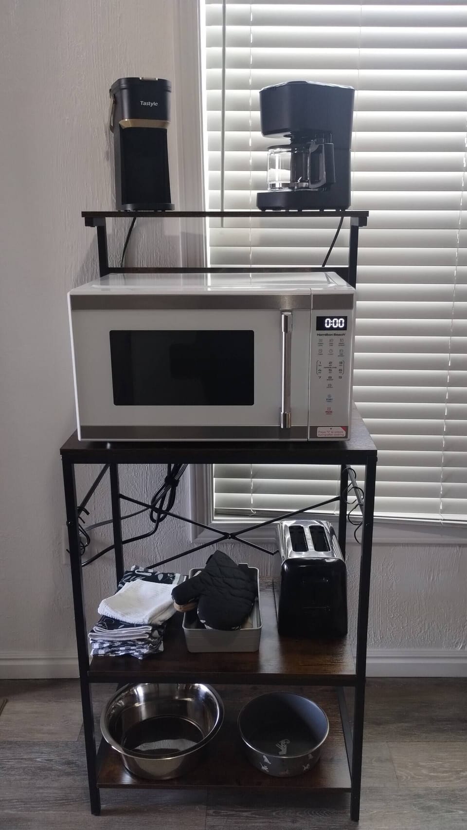 Keurig style and traditional coffee machines. Large microwave. Dog bowls.