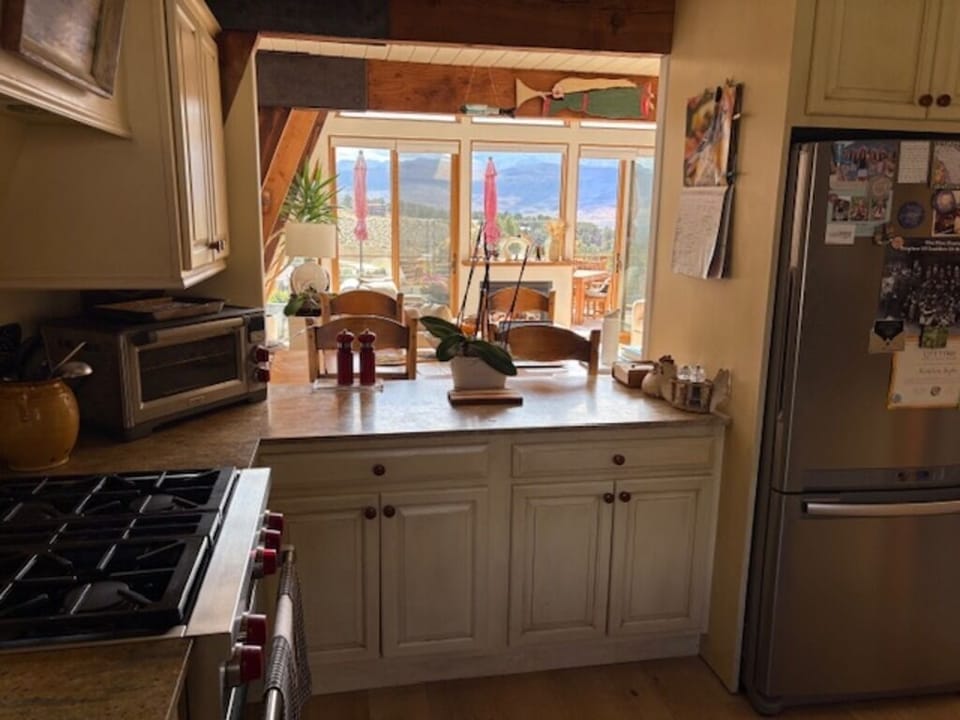 Open kitchen view to dining area and living room