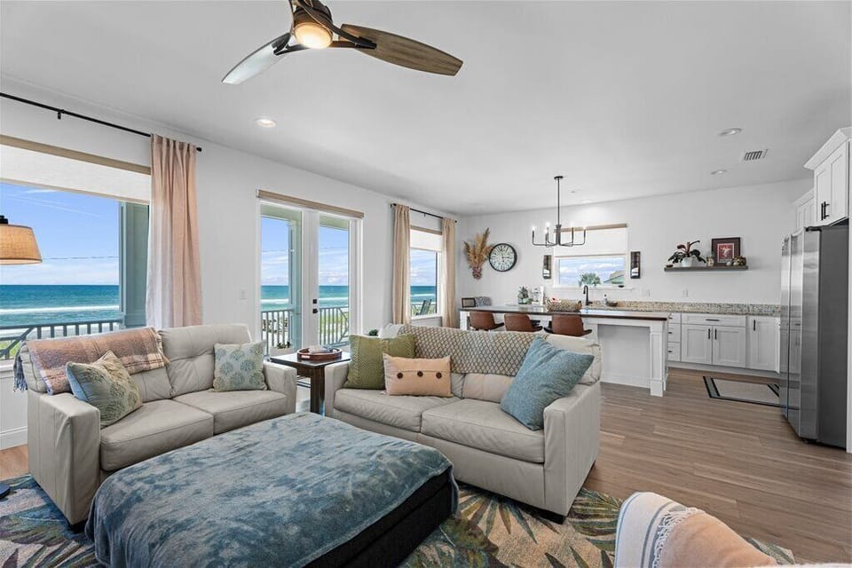 Spacious open-concept living room with ocean views. Relax and enjoy!