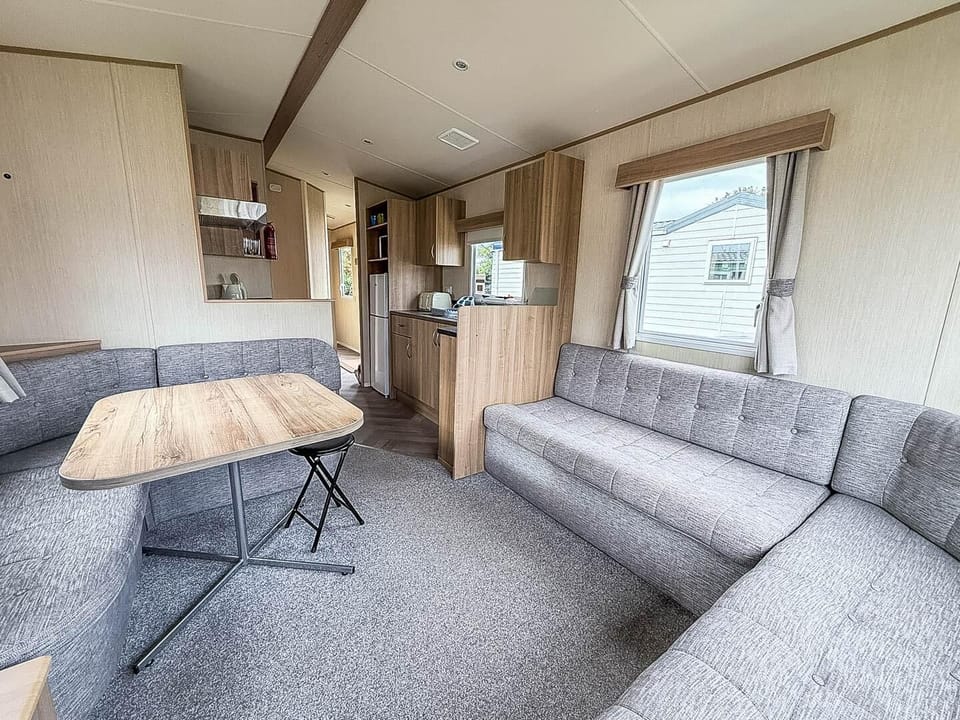 Relax in style after a day exploring the coast in our spacious caravan living areas at California Cliffs Holiday Park.