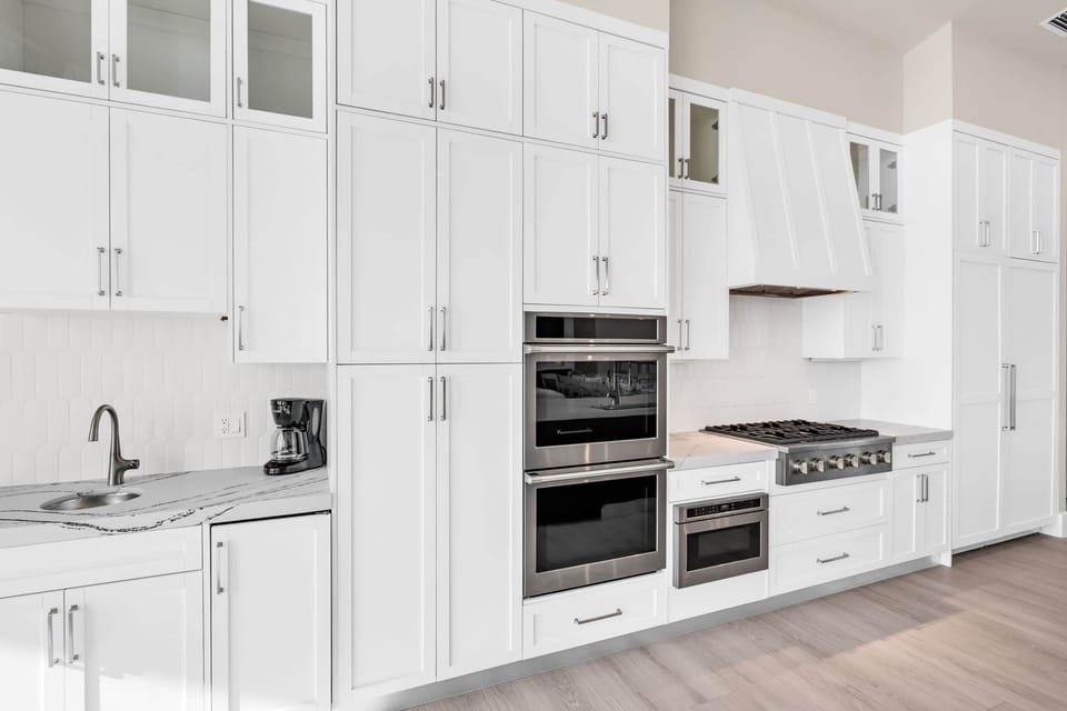 Kitchen with drip coffee, oven, microwave and stove