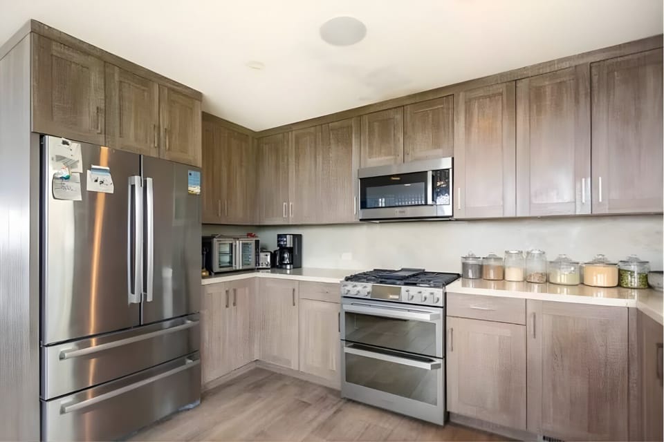 A kitchen so sleek it might inspire accidental gourmet moments