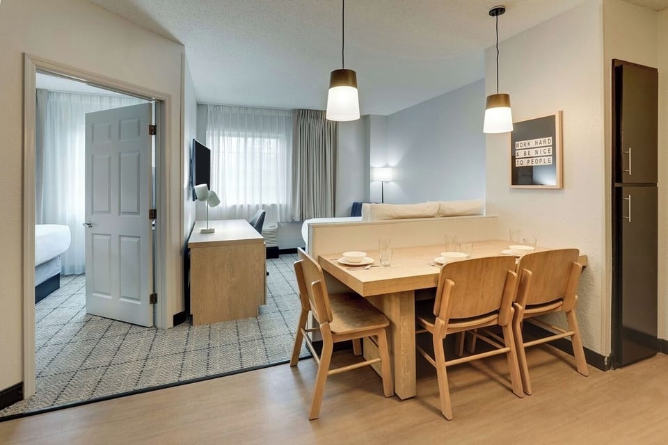 Step into an airy suite with space to dine together.