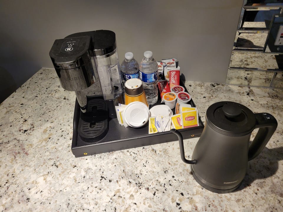 Enjoy a warm welcome with complimentary water, coffee, tea, & treats.