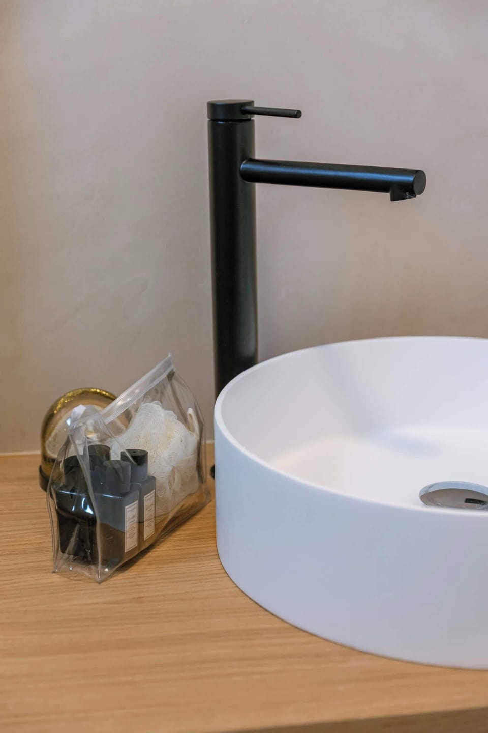 Minimalist sink with black tap, sleek and functional