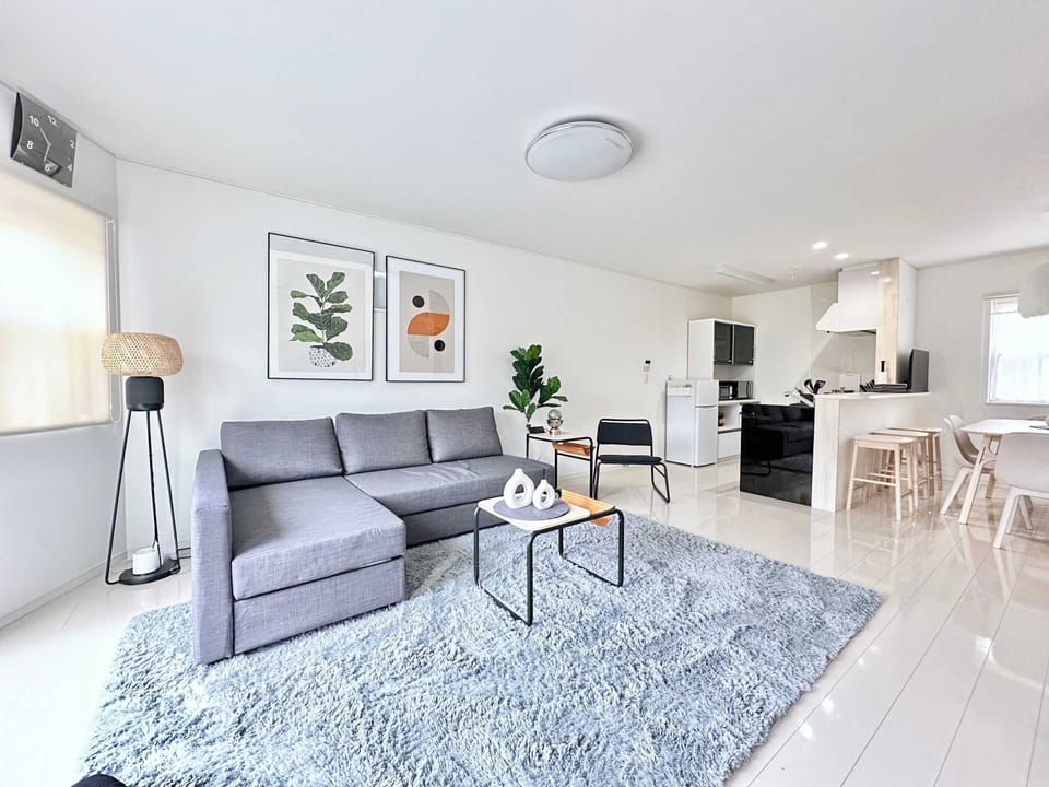 Living spaces and kitchen island at right side