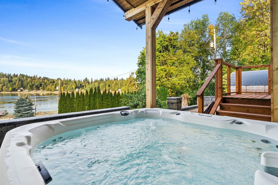 Soak up the sun and stunning waterviews from the relaxing hot tub—pure bliss