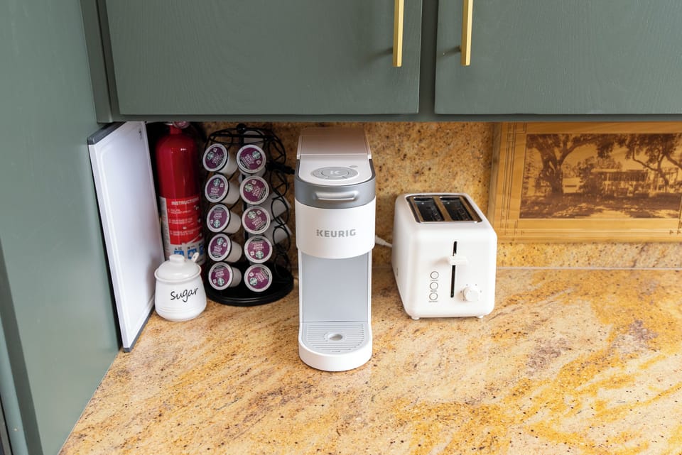 Everything you need for a perfect morning, featuring a coffee station, toaster, and all the essentials for easy, convenient breakfasts.