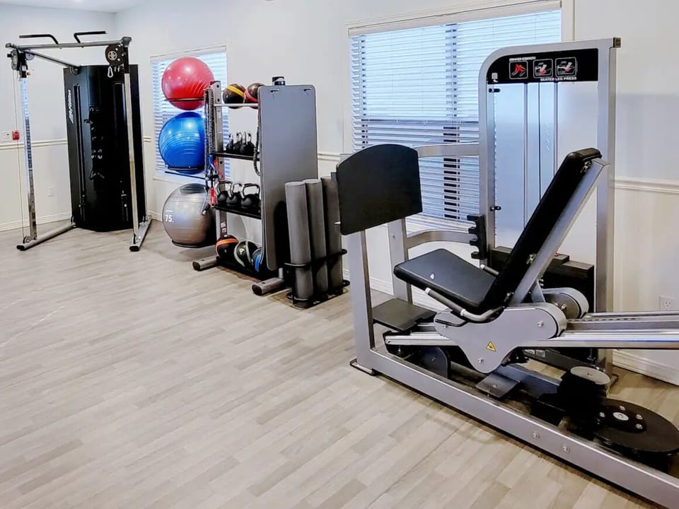 Strengthen your routine with weights, machines, and stretching space.