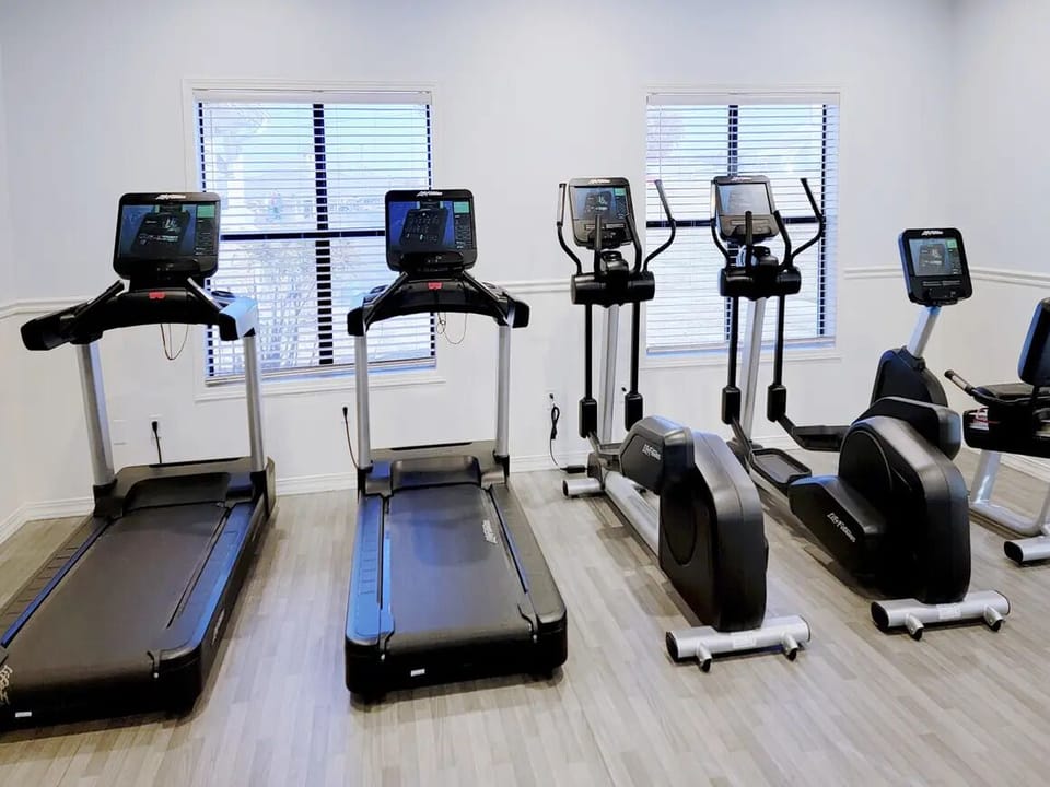 Boost your energy with treadmills and cardio machines steps away.
