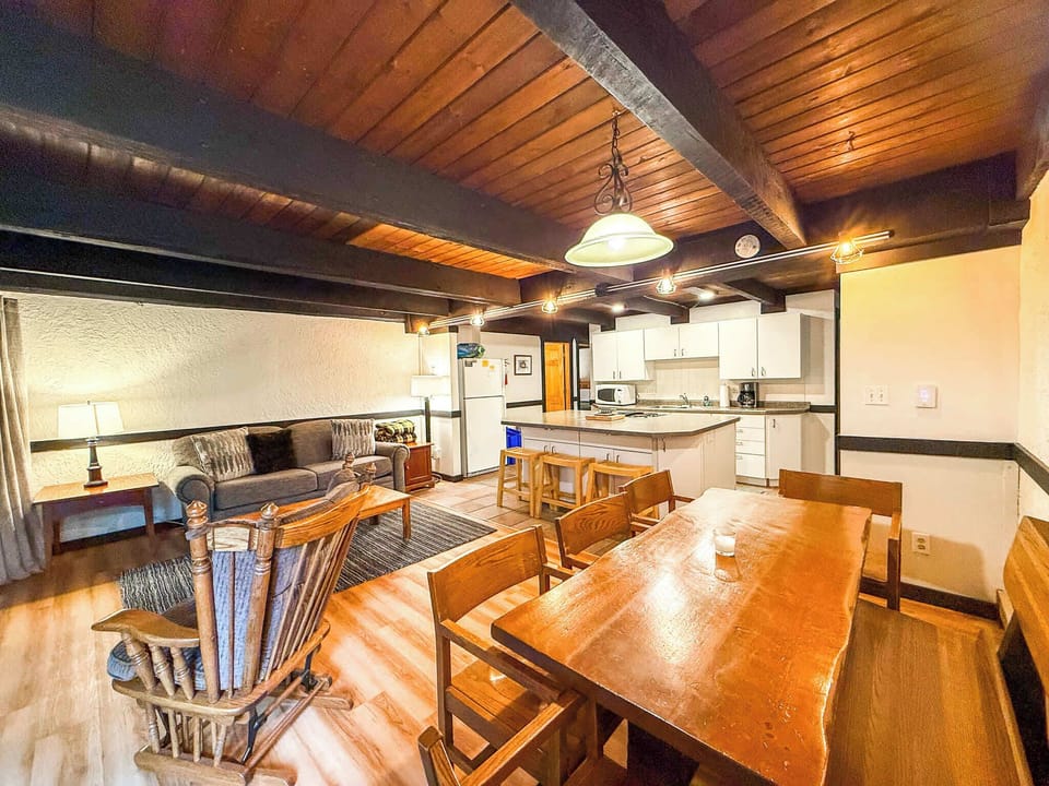 Enjoy this open concept living, dining and kitchen space, perfect for your group to mingle and relax.