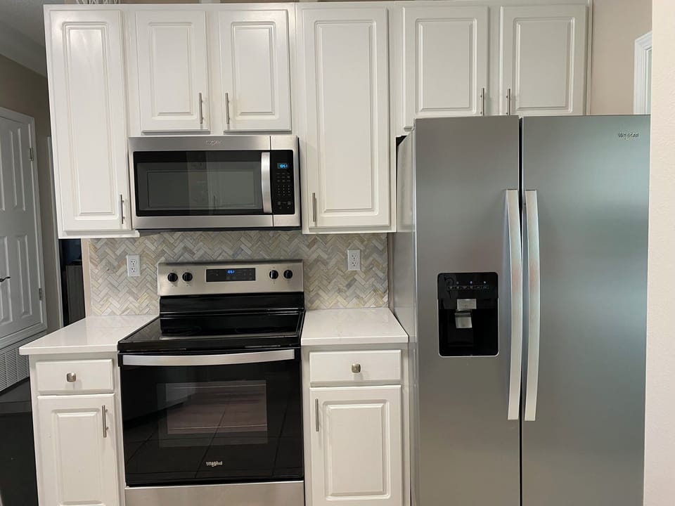 Big fridge, pots, pans, assorted dry spices for you to cook in