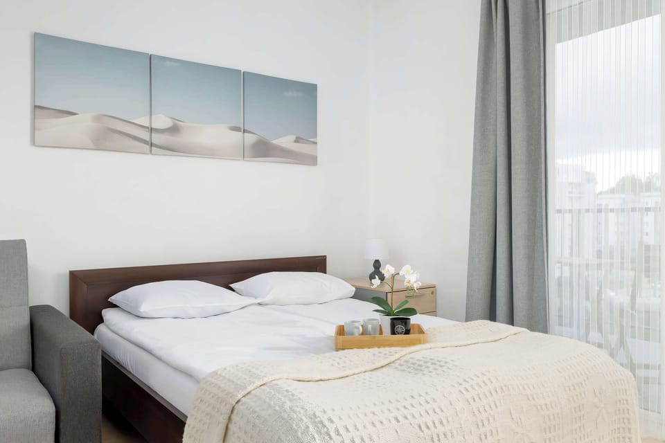 The living area offers a bright and airy space for relaxation.
