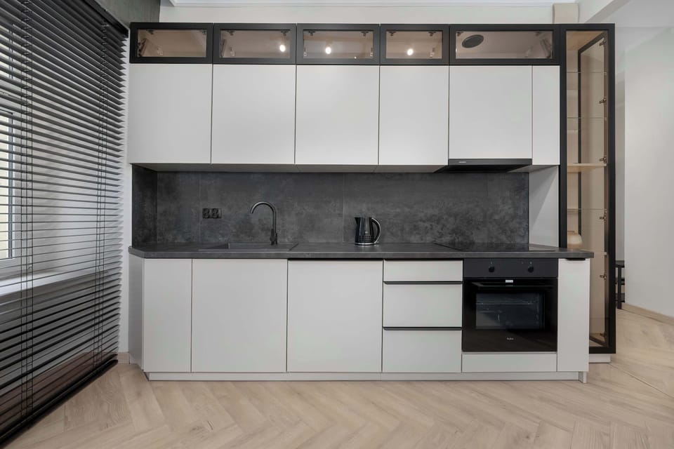 The fully equipped kitchenette includes everything you need for a home-cooked meal.