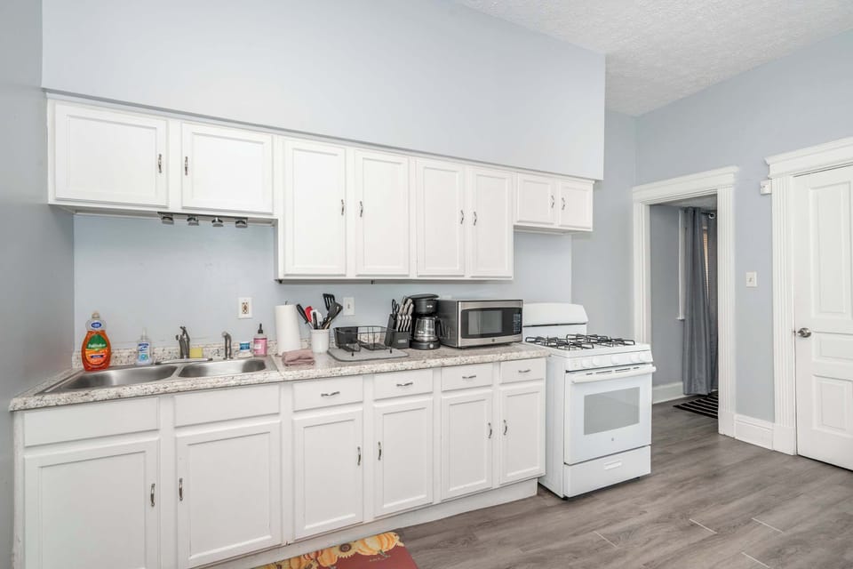 Suite 1’s inviting eat-in kitchen offers ample space & all the comforts of home​