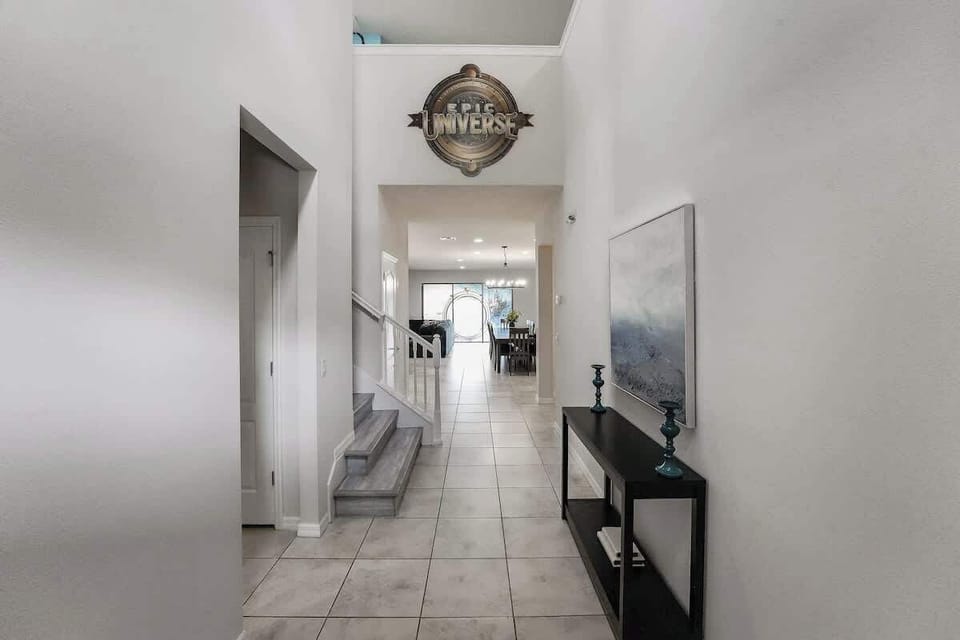 Step into a grand entryway leading to exciting adventures, featuring a hint of magic ahead