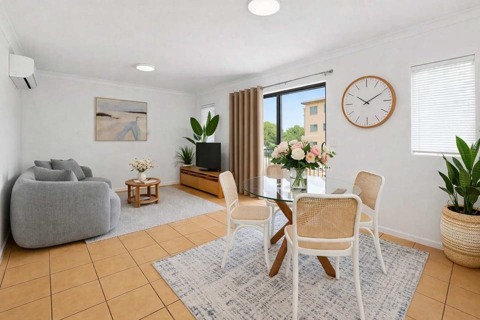 Comfortable lounge with smart TV & natural light
