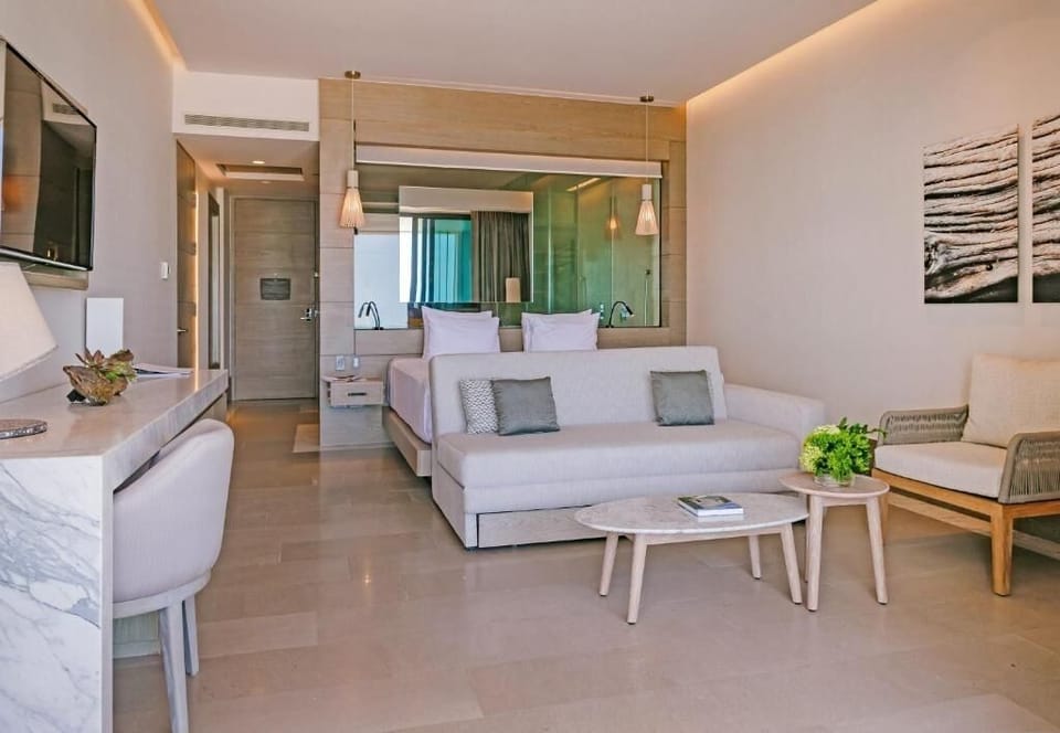 Unwind in a spacious suite with calming, modern coastal style.