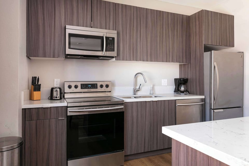 "Prepare meals with ease in our fully-equipped kitchen."