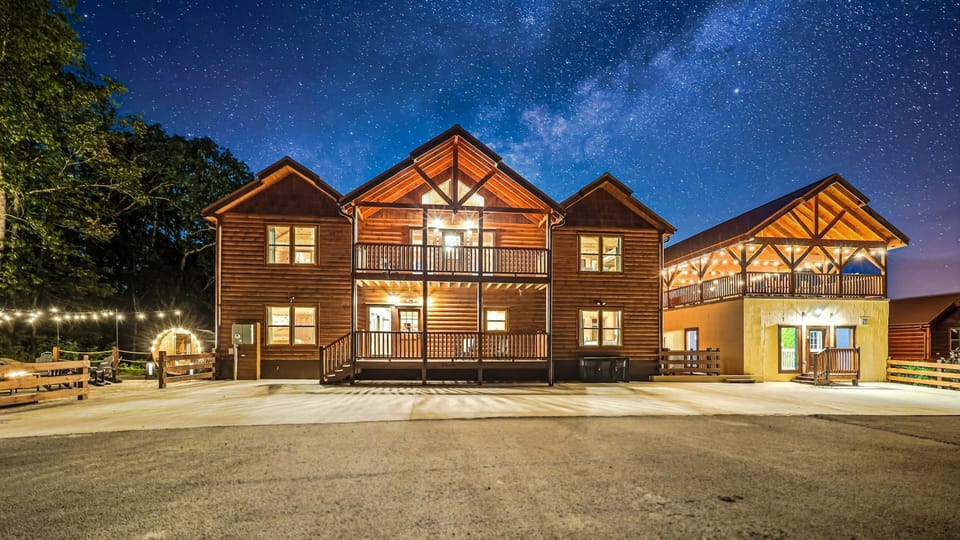 Game Time Retreat is a large, luxurious cabin that is 5,800 square feet and has Waterfall, Firepit, an EPIC Game Room, Indoor Pool, Outdoor Theater, Spa, Outdoor Sauna and More!