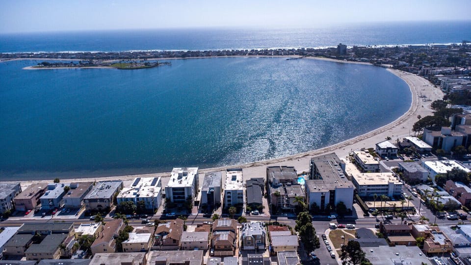 Located right on the bay & a short walk to the ocean