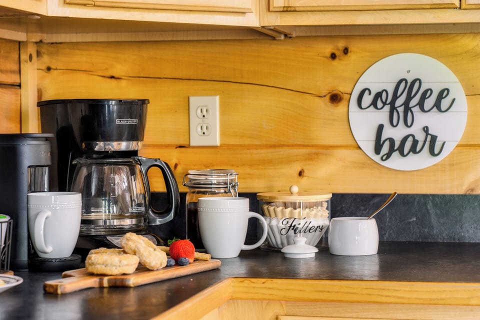 Coffee bar includes a Keurig and drip coffee maker, plus complimentary coffee. 