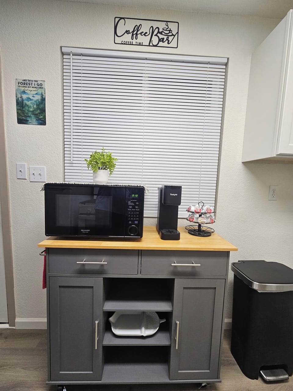 Coffee bar, microwave and pod type coffee maker, coffee provided.